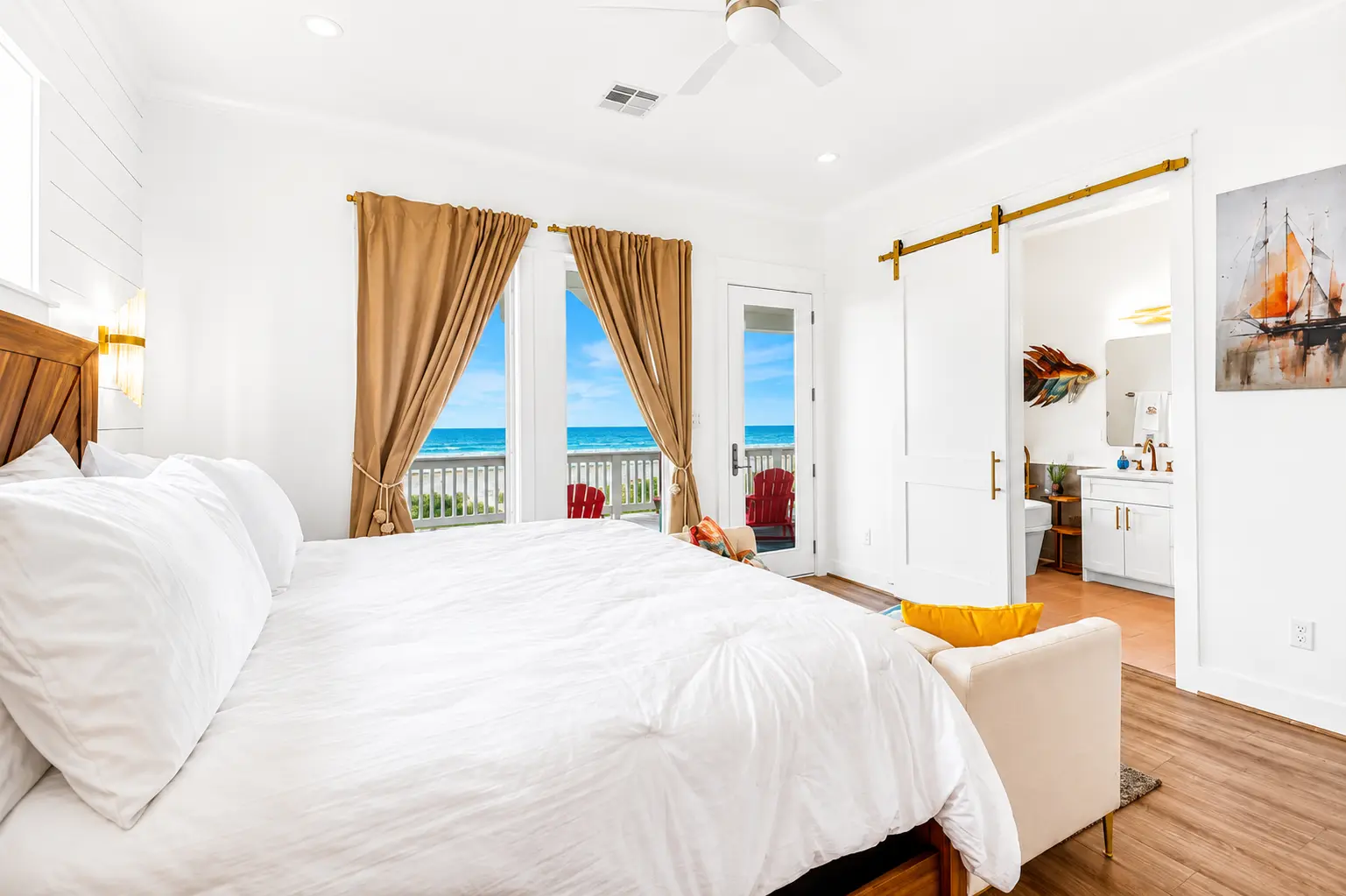 Guest bedroom with king bed and beach views